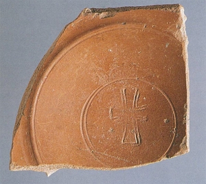 Late hispanic terra sigillata fragment with Chi Rho